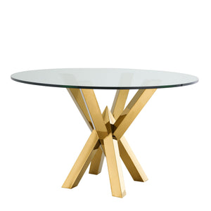 طاولة طعام مطلية باللون الذهبي من تصميم ميلاني للتصميم الداخلي