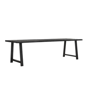 Dining table A-team by Melanie Interior Design is part of the DTP Home Timeless Black collection. The table is made from recycled teak and has been stained black, topped with a clear polish.
